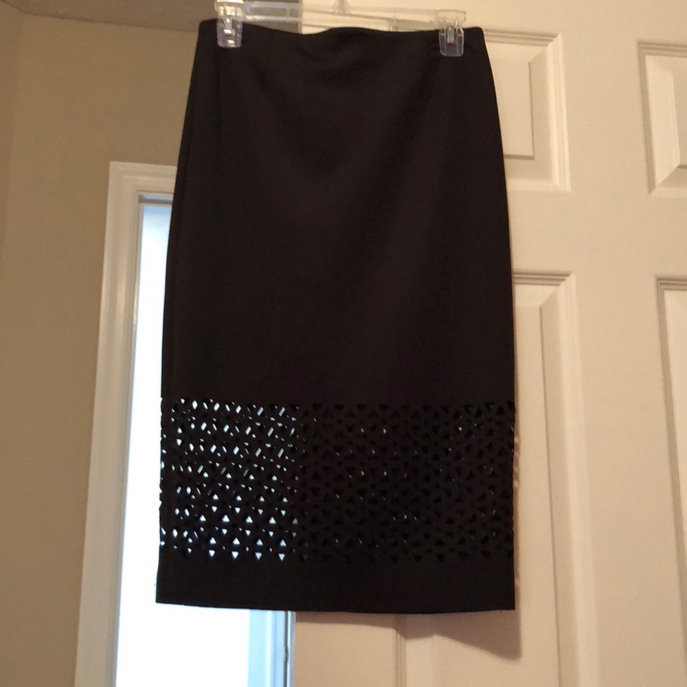 Black pencil skirt laser cut out bottom detail